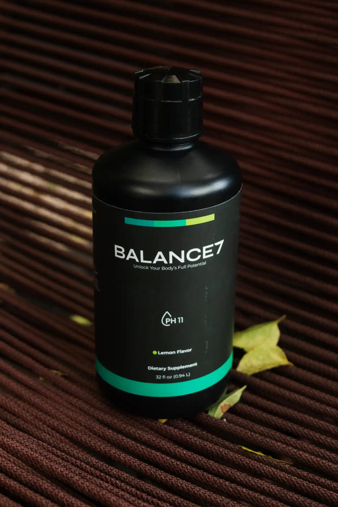 Black bottle of Balance7 dietary supplement.
