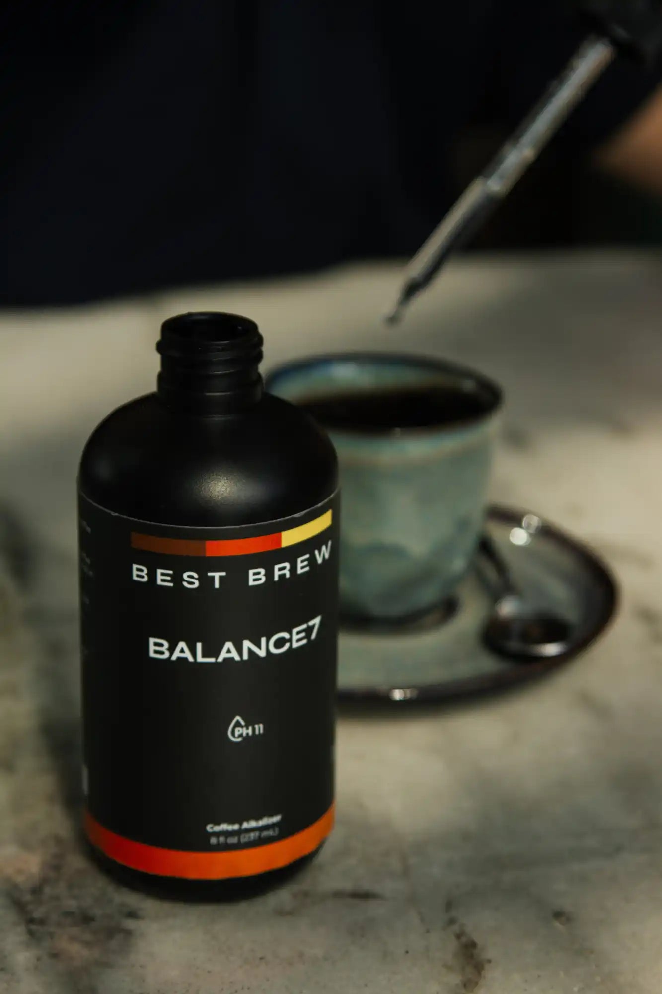 Black bottle of coffee additive.