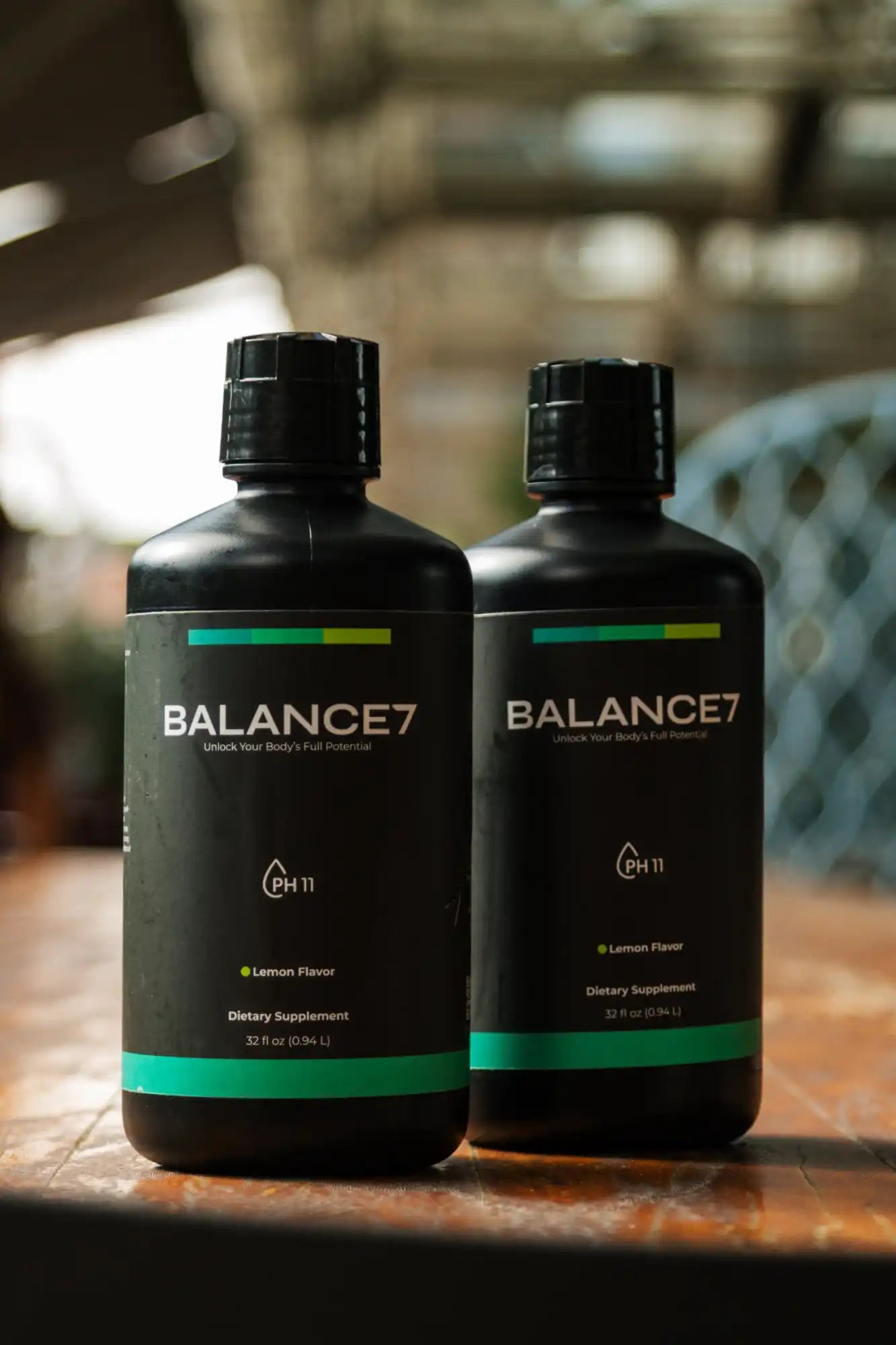 Two black bottles of Balance7 dietary supplement.